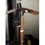 A Trespass Transcender walking pole and an ice axe