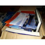 A box of Marine shipping books and booklets