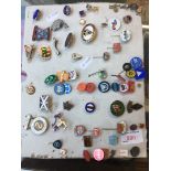 A board of enamel badges