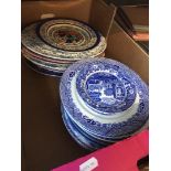 A box of mainly blue and white plates including a Royal Doulton