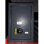 An S-20K mechanical safe with key