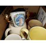 A box containing Royal memorabilia mugs and some vases