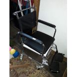 A wheeled commode / wheelchair