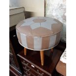 A retro round stool/pouffe