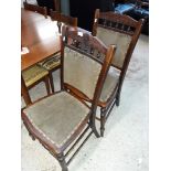 A pair of oak chairs with turned legs and spindles