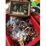 Red tub of costume jewellery
