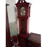 A reproduction long case clock