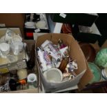 A quantity of 12 small boxes containing glassware, pottery, figurines, vases, mugs, few Goss