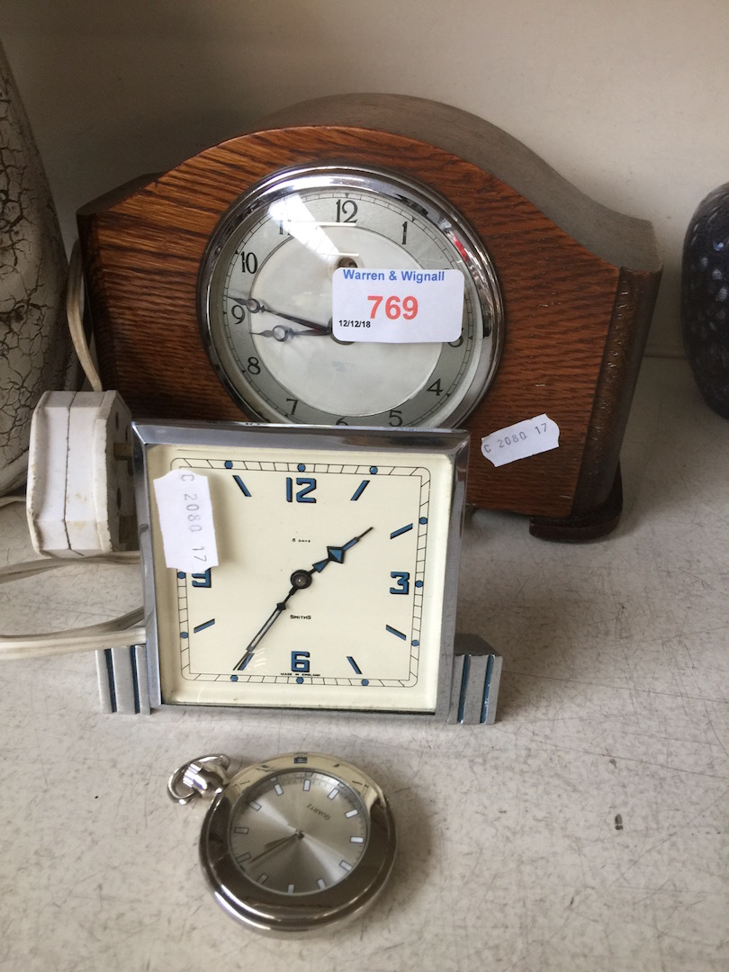 2 mantel clocks and a pocket watch