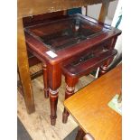 A nest of 2 glass top tables and a cabinet