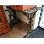 An old pub table with cast metal base