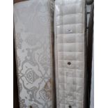 A double divan cream floral patterned bed