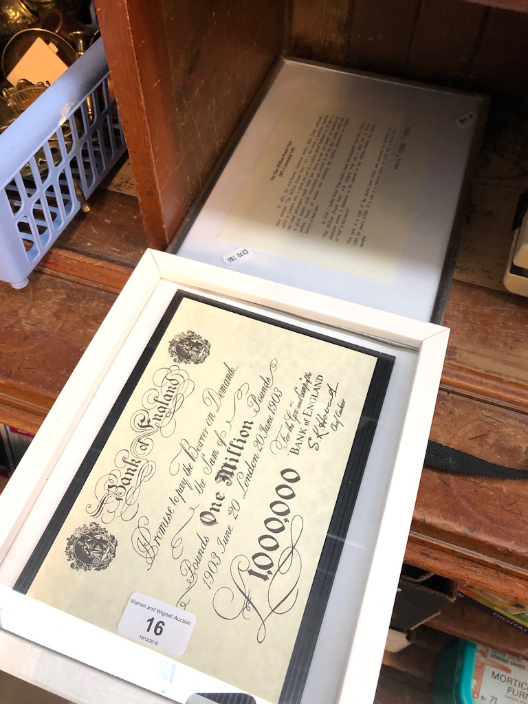 A reproduction framed one million pound bank note with framed description