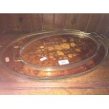 Two oval marquetry trays with metal rails