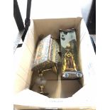 A box with brass, boxed doll and other items