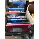 A box of various books including history