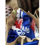 A bag of 1990s football shirts including Liverpool, Chelsea, Glasgow Rangers and England shirts