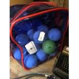 A bag of golf balls
