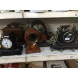 A quantity of clock cases and spares/repairs.