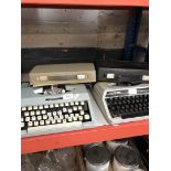 A Silver Reed and Imperial typewriters