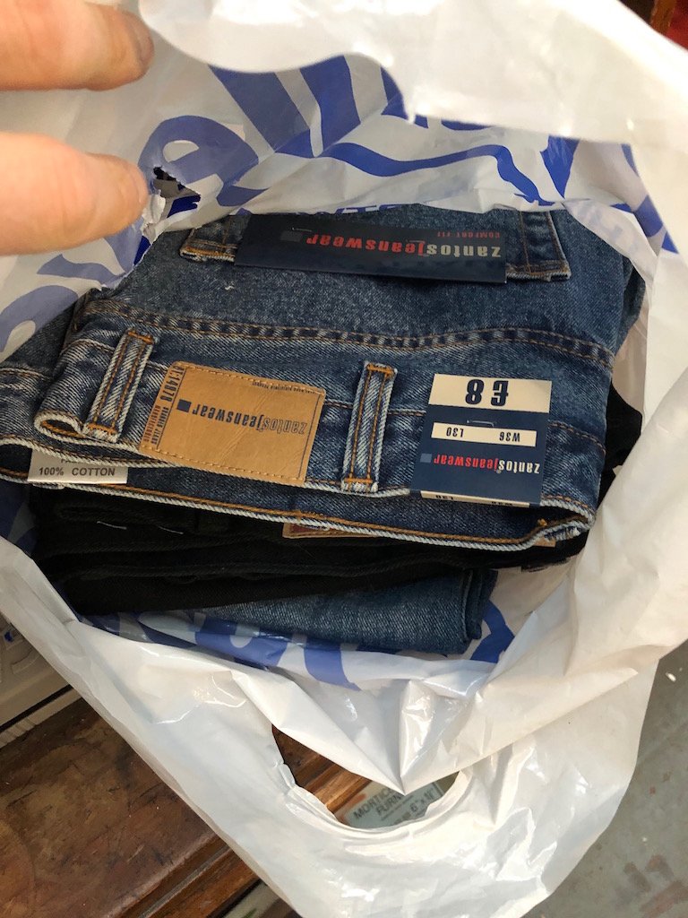 A bag of Jeans complete with tags
