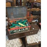 A tin box with bobbins and a wooden box.