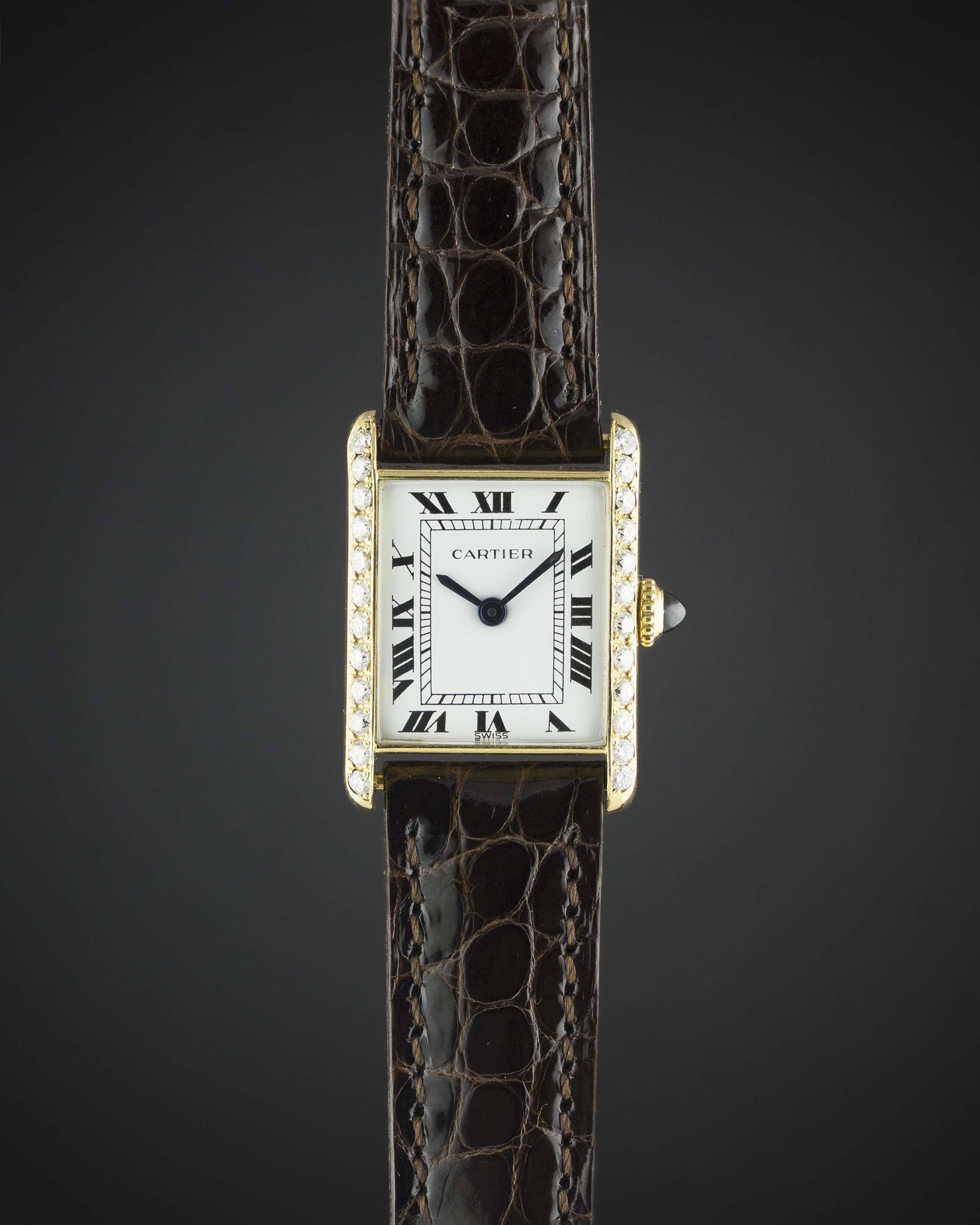 A LADIES 18K SOLID GOLD CARTIER TANK 