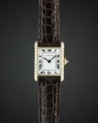 A LADIES 18K SOLID GOLD CARTIER TANK WRIST WATCH CIRCA 1980s Movement: Manual wind, signed