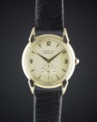 A GENTLEMAN'S 14K SOLID GOLD TIFFANY & CO MOVADO AUTOMATIC WRIST WATCH CIRCA 1950s, REF. 4251