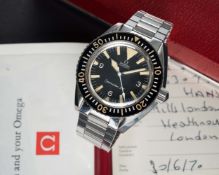 A VERY RARE GENTLEMAN'S STAINLESS STEEL OMEGA SEAMASTER 300 "BIG TRIANGLE" AUTOMATIC BRACELET