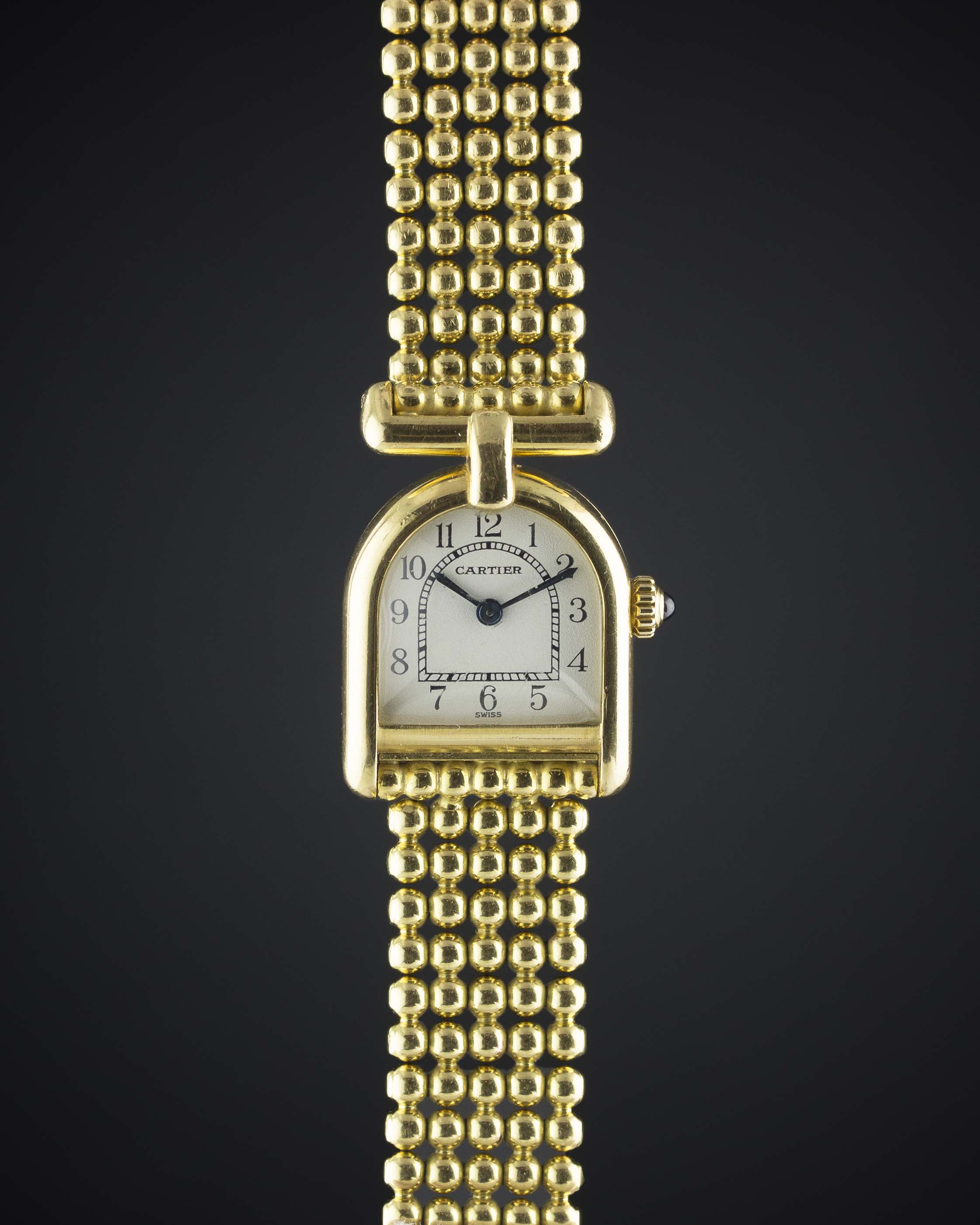 A LADIES 18K SOLID GOLD CARTIER PARIS CALANDRE  "LA CLOCHE" BRACELET WATCH CIRCA 1990s Movement: