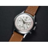 A RARE GENTLEMAN'S STAINLESS STEEL HEUER "WATERPROOF" CHRONOGRAPH WRIST WATCH CIRCA 1950s, WITH