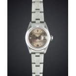 A LADIES STAINLESS STEEL ROLEX OYSTER PERPETUAL DATE BRACELET WATCH CIRCA 2004, REF. 79160 WITH