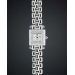 A LADIES 18K WHITE GOLD & DIAMOND CHOPARD BRACELET WATCH CIRCA 1990s Movement: Manual wind, signed