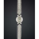 A LADIES 18K SOLID WHITE GOLD & DIAMOND BLANCPAIN BRACELET WATCH CIRCA 1960s Movement: Manual back-