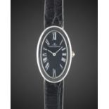 A LADIES 18K SOLID WHITE GOLD JAEGER LECOULTRE WRIST WATCH CIRCA 1970s, WITH BLUE EMBOSSED DIAL