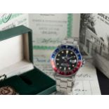 A RARE GENTLEMAN'S STAINLESS STEEL ROLEX OYSTER PERPETUAL DATE GMT MASTER BRACELET WATCH DATED 1972,