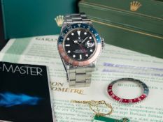 A RARE GENTLEMAN'S STAINLESS STEEL ROLEX OYSTER PERPETUAL DATE GMT MASTER BRACELET WATCH DATED 1974,