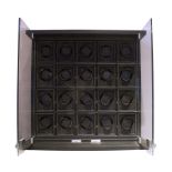 A LEATHER 20 MODULE WATCH WINDER CABINET BY UNDERWOOD OF LONDON REF. UN844, RETAIL PRICE $19,750