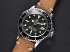 A RARE GENTLEMAN'S STAINLESS STEEL ROLEX OYSTER PERPETUAL DATE "RED WRITING" SUBMARINER WRIST