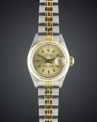 A LADIES STEEL & GOLD ROLEX OYSTER PERPETUAL DATEJUST BRACELET WATCH DATED 1990, REF. 69173 WITH