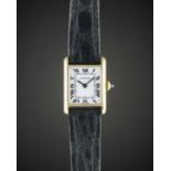 A LADIES 18K SOLID GOLD CARTIER TANK WRIST WATCH CIRCA 1980s Movement: Manual wind, signed