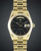 A GENTLEMAN'S 18K SOLID GOLD ROLEX OYSTER PERPETUAL DAY DATE BRACELET WATCH CIRCA 1987, REF. 18038