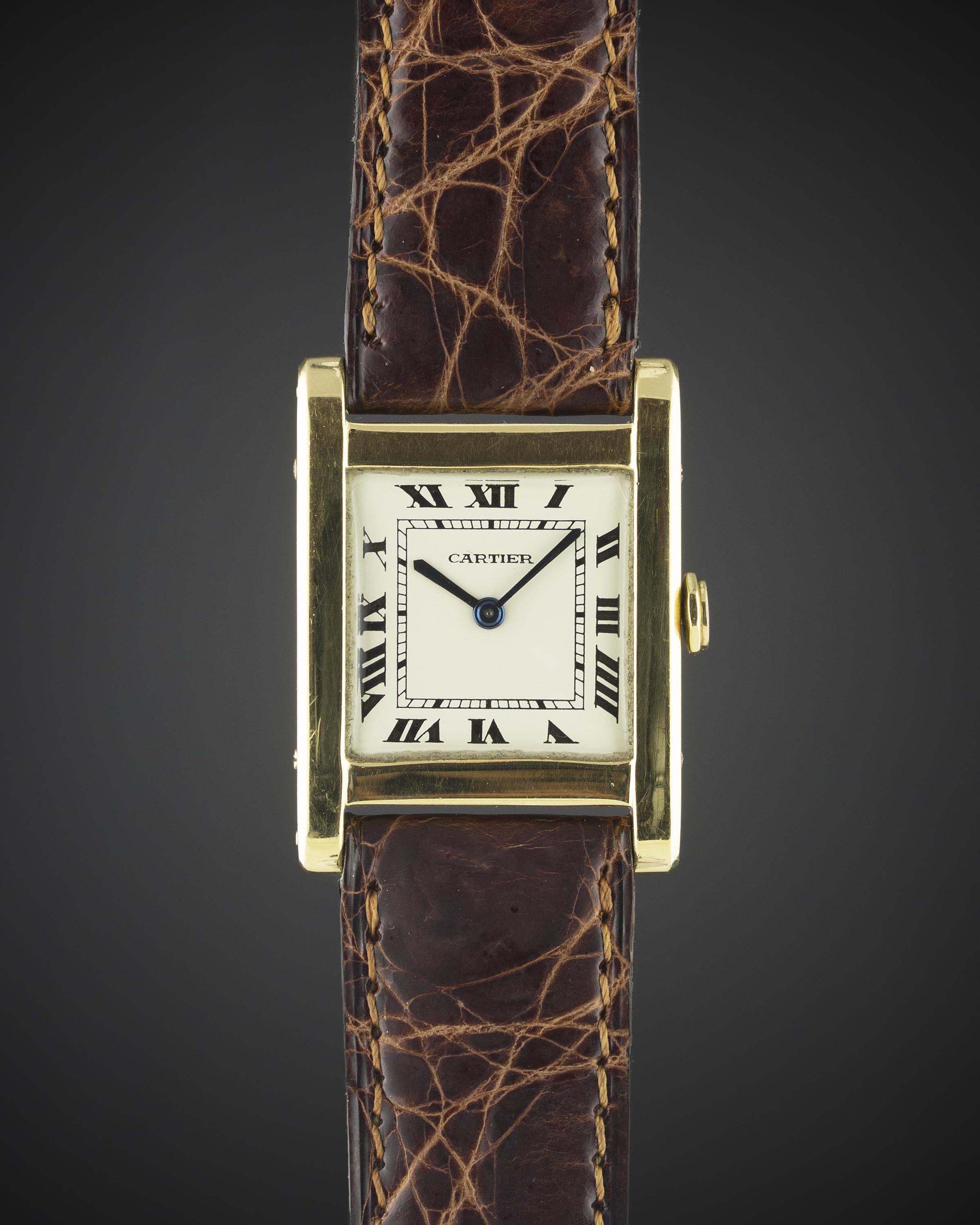 A RARE GENTLEMAN'S 18K SOLID GOLD CARTIER TANK NORMALE WRIST WATCH CIRCA 1960, WITH CARTIER BOX