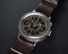 A RARE GENTLEMAN'S LARGE SIZE STAINLESS STEEL TITUS SINGLE BUTTON CHRONOGRAPH WRIST WATCH CIRCA