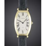 A LARGE SIZE 18K SOLID GOLD CARTIER PARIS TONNEAU WRIST WATCH CIRCA 1990, FROM THE COLLECTION PRIVEE