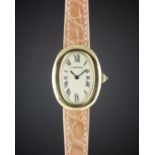 A LADIES 18K SOLID GOLD CARTIER BAIGNOIRE WRIST WATCH CIRCA 1990s, REF. 8057910 Movement: Quartz,