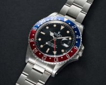 A RARE GENTLEMAN'S STAINLESS STEEL ROLEX OYSTER PERPETUAL GMT MASTER BRACELET WATCH CIRCA 1984, REF.