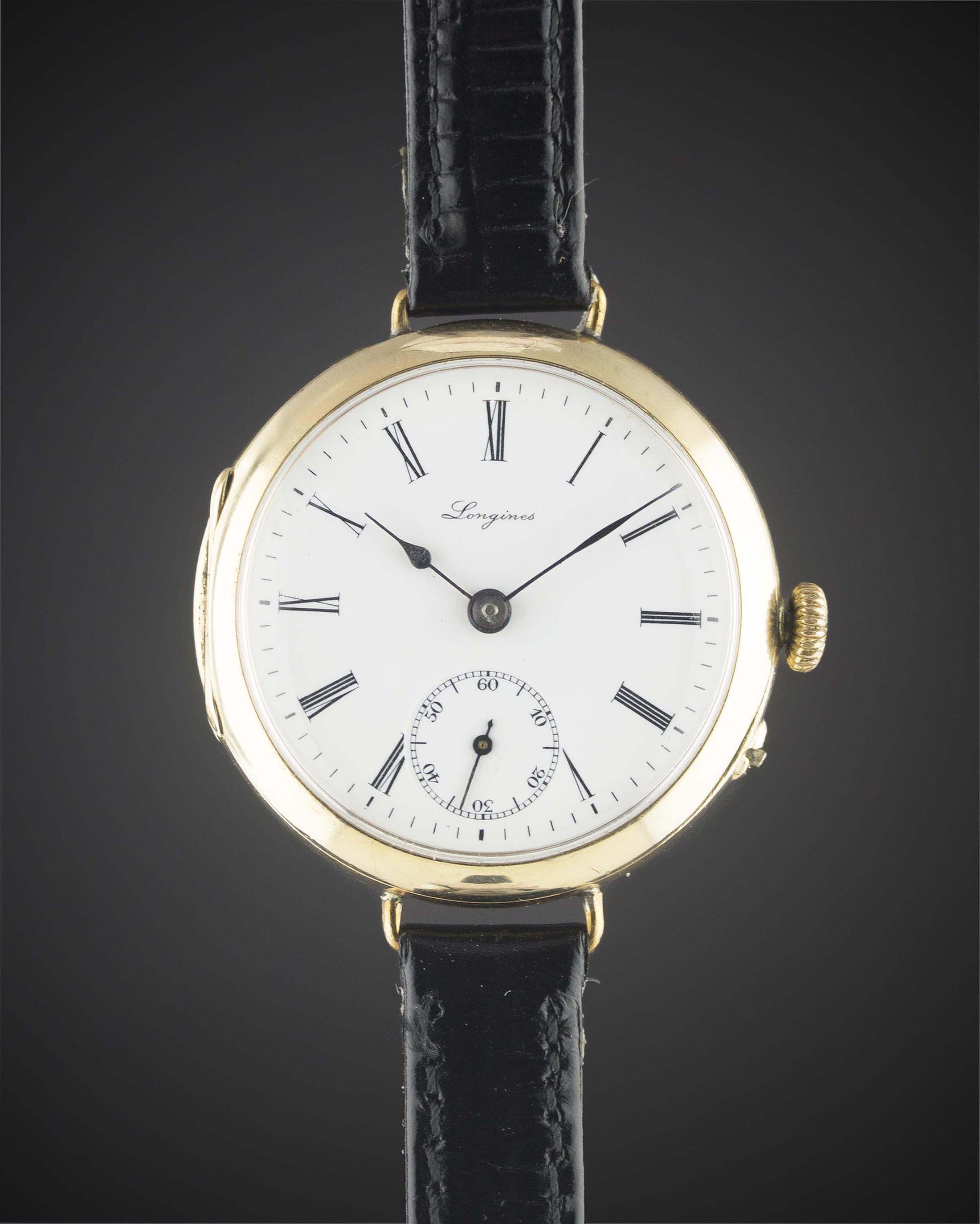 A GENTLEMAN'S 9CT SOLID GOLD LONGINES 