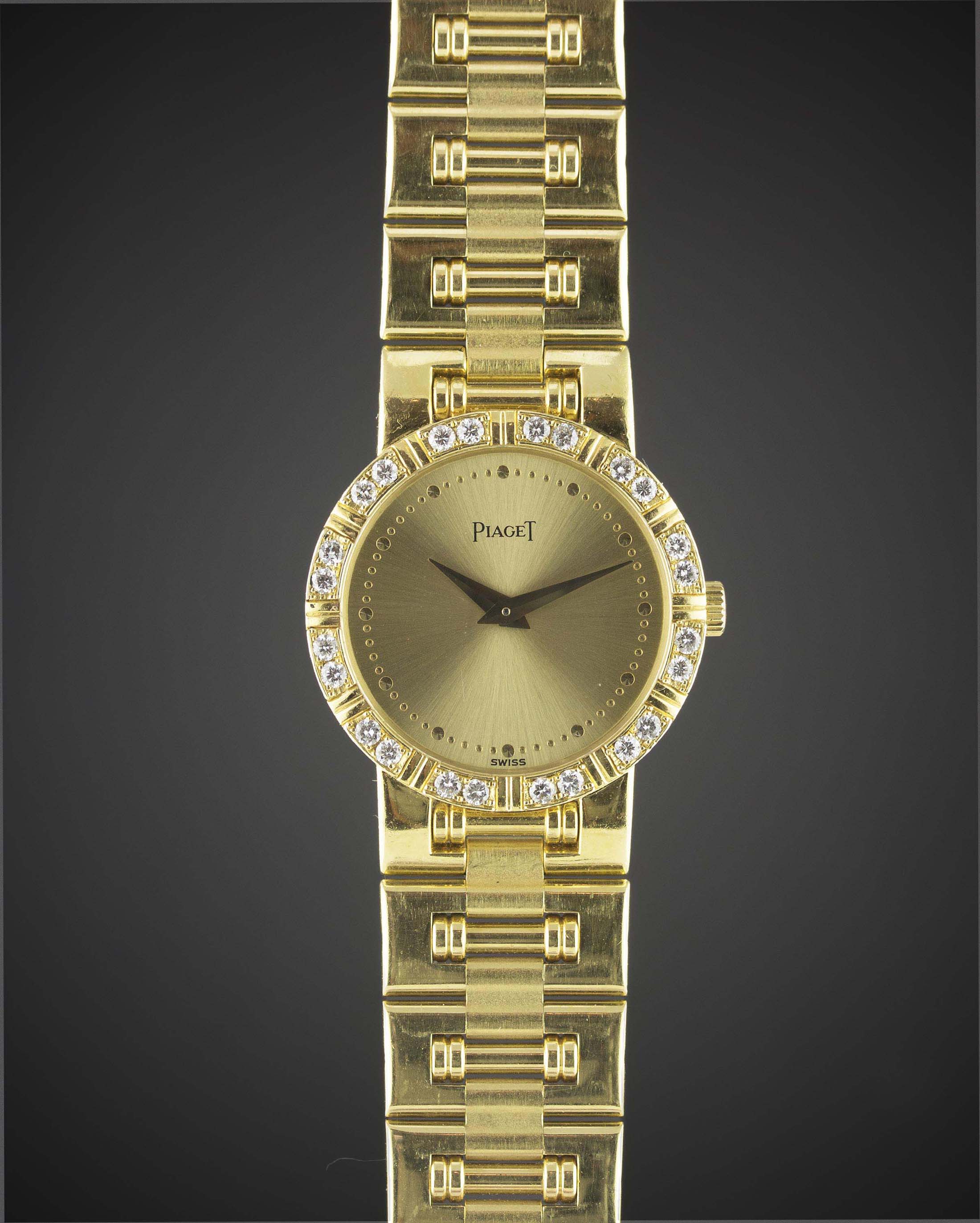 A LADIES 18K SOLID GOLD & DIAMOND PIAGET DANCER BRACELET WATCH CIRCA 1990s, REF. 80564 K81 WITH